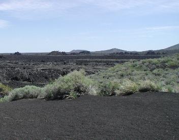  Craters of the Moon Lava Beds and distant cinder cones